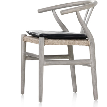 Muestra Dining Chair by Four Hands. Made from solid teak, 100% polyethylene in a coastal style.