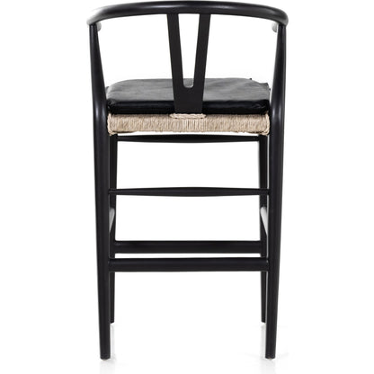 Muestra Counter Stool by Four Hands in vintage white, black teak. Made from solid teak, 100% polyethylene in a coastal style.