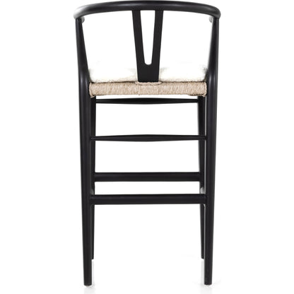 Muestra Bar Stool by Four Hands in vintage white, natural teak. Made from solid teak, 100% polyethylene in a coastal style.