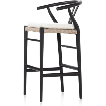 Muestra Bar Stool by Four Hands in vintage white, natural teak. Made from solid teak, 100% polyethylene in a coastal style.