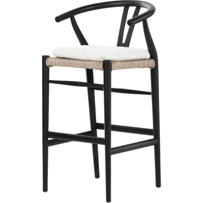 Muestra Bar Stool by Four Hands in vintage white, natural teak. Made from solid teak, 100% polyethylene in a coastal style.