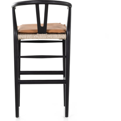 Muestra Bar Stool by Four Hands in vintage white, natural teak. Made from solid teak, 100% polyethylene in a coastal style.