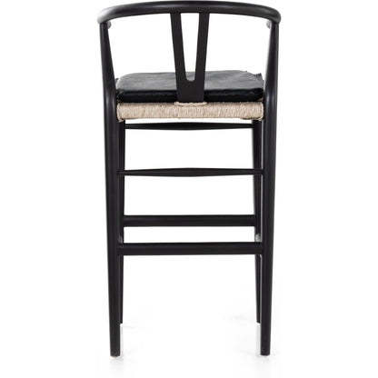 Muestra Bar Stool by Four Hands in vintage white, natural teak. Made from solid teak, 100% polyethylene in a coastal style.