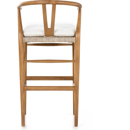 Muestra Bar Stool by Four Hands in vintage white, natural teak. Made from solid teak, 100% polyethylene in a coastal style.