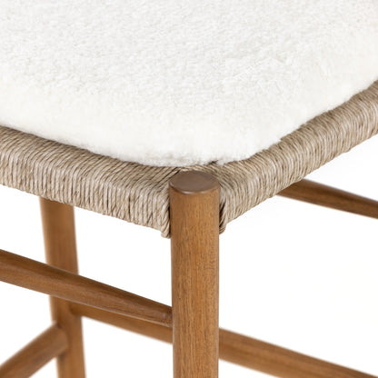 Muestra Bar Stool by Four Hands in vintage white, natural teak. Made from solid teak, 100% polyethylene in a coastal style.