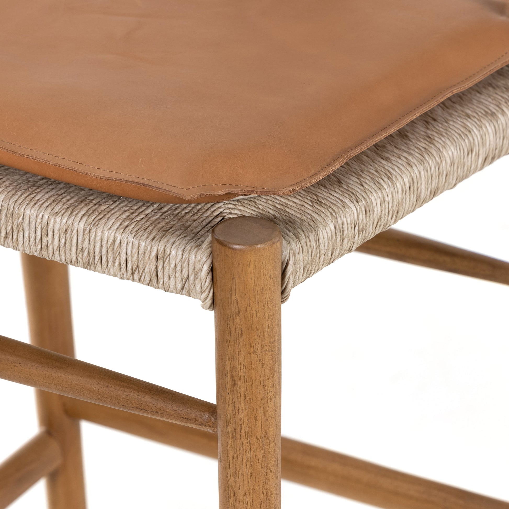 Muestra Bar Stool by Four Hands in vintage white, natural teak. Made from solid teak, 100% polyethylene in a coastal style.