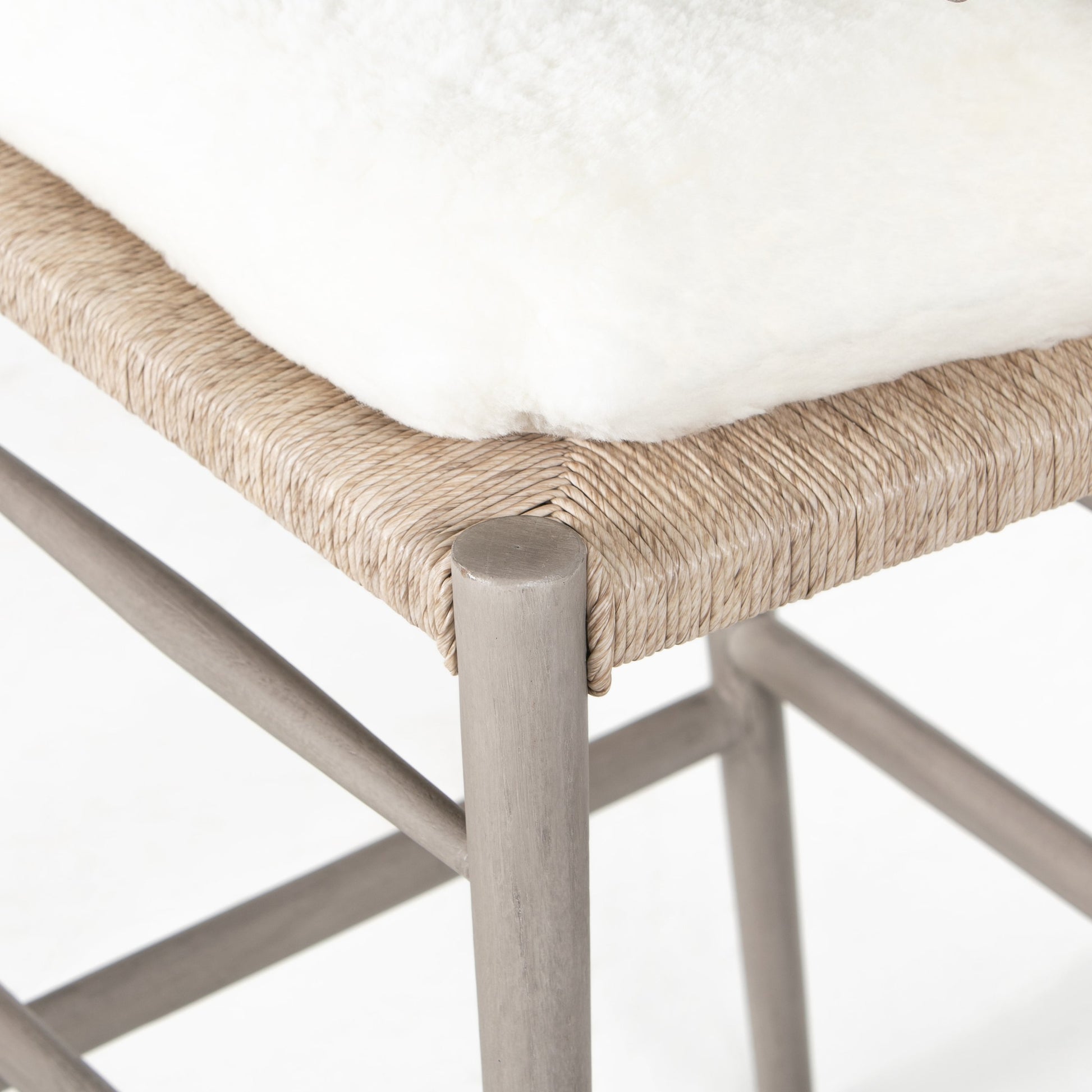 Muestra Bar Stool by Four Hands in vintage white, natural teak. Made from solid teak, 100% polyethylene in a coastal style.