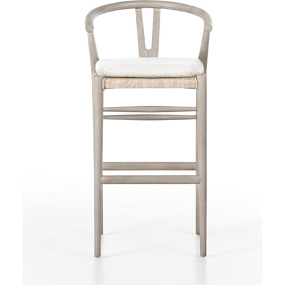 Muestra Bar Stool by Four Hands in vintage white, natural teak. Made from solid teak, 100% polyethylene in a coastal style.