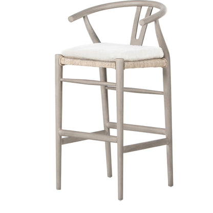 Muestra Bar Stool by Four Hands in vintage white, natural teak. Made from solid teak, 100% polyethylene in a coastal style.