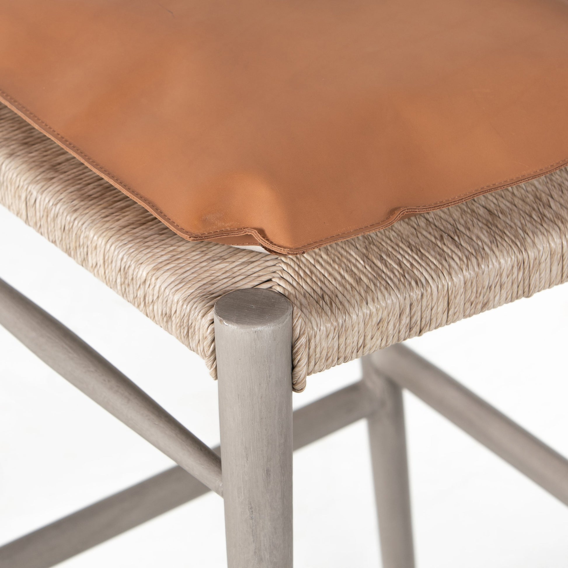 Muestra Bar Stool by Four Hands in vintage white, natural teak. Made from solid teak, 100% polyethylene in a coastal style.