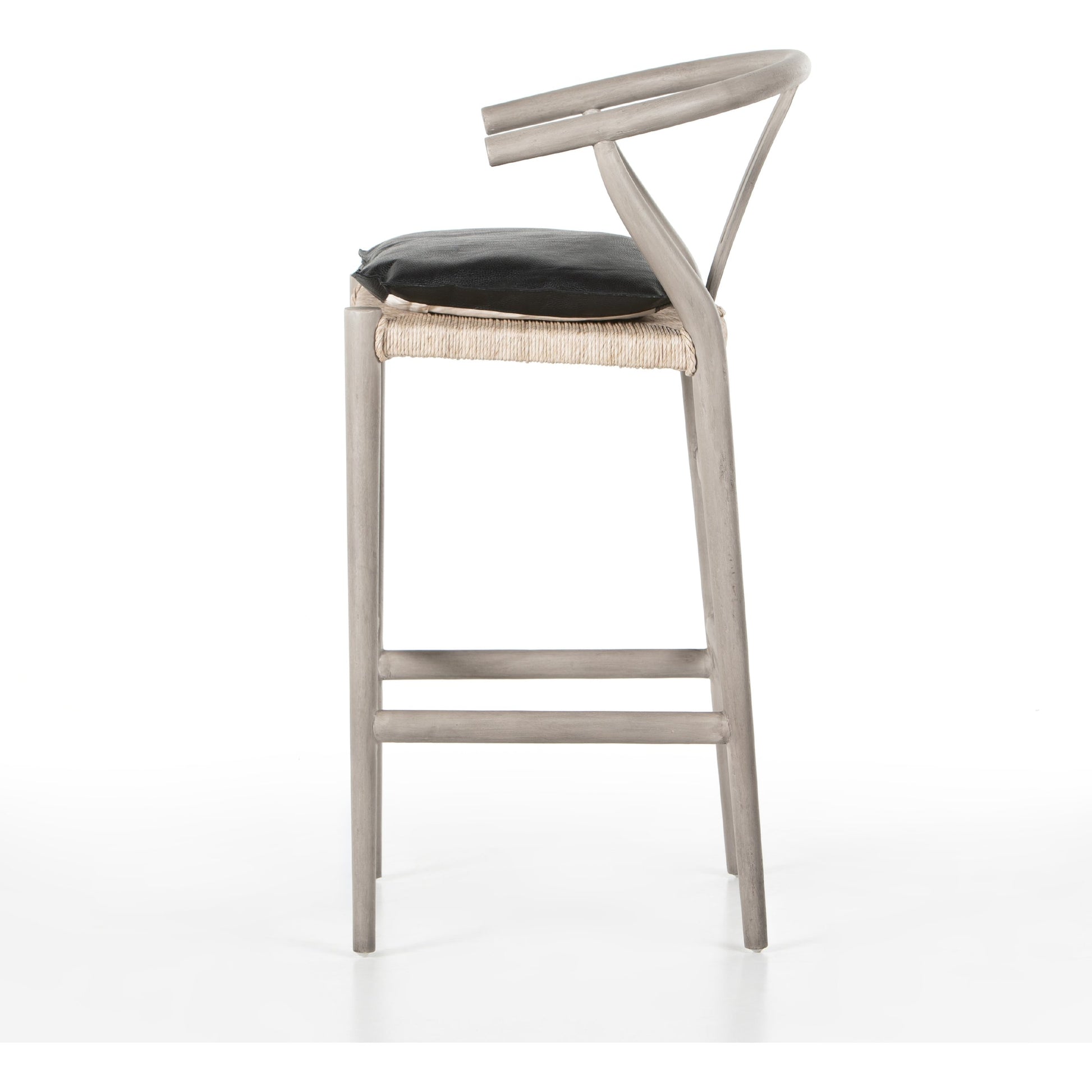 Muestra Bar Stool by Four Hands in vintage white, natural teak. Made from solid teak, 100% polyethylene in a coastal style.