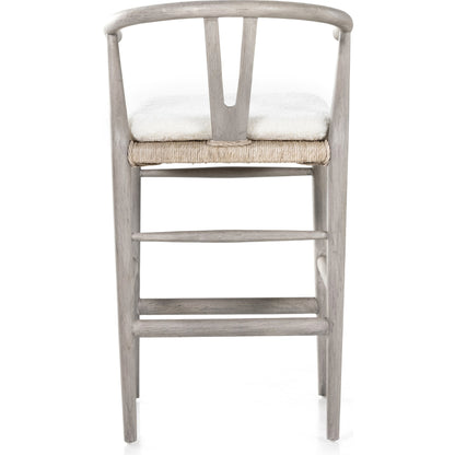 Muestra Counter Stool by Four Hands in vintage white, black teak. Made from solid teak, 100% polyethylene in a coastal style.