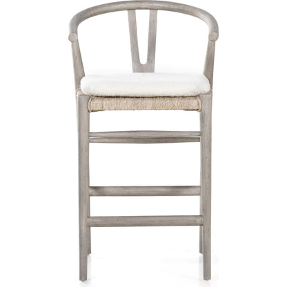 Muestra Counter Stool by Four Hands in vintage white, black teak. Made from solid teak, 100% polyethylene in a coastal style.