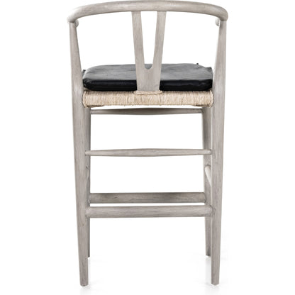 Muestra Counter Stool by Four Hands in vintage white, black teak. Made from solid teak, 100% polyethylene in a coastal style.