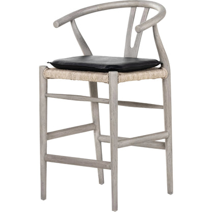Muestra Counter Stool by Four Hands in vintage white, black teak. Made from solid teak, 100% polyethylene in a coastal style.