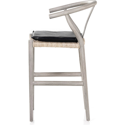 Muestra Counter Stool by Four Hands in vintage white, black teak. Made from solid teak, 100% polyethylene in a coastal style.