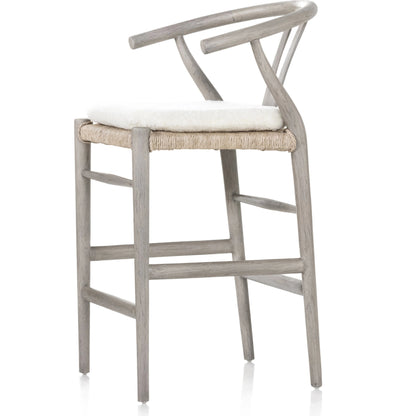 Muestra Counter Stool by Four Hands in vintage white, black teak. Made from solid teak, 100% polyethylene in a coastal style.