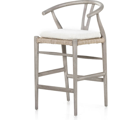 Muestra Counter Stool by Four Hands in vintage white, black teak. Made from solid teak, 100% polyethylene in a coastal style.