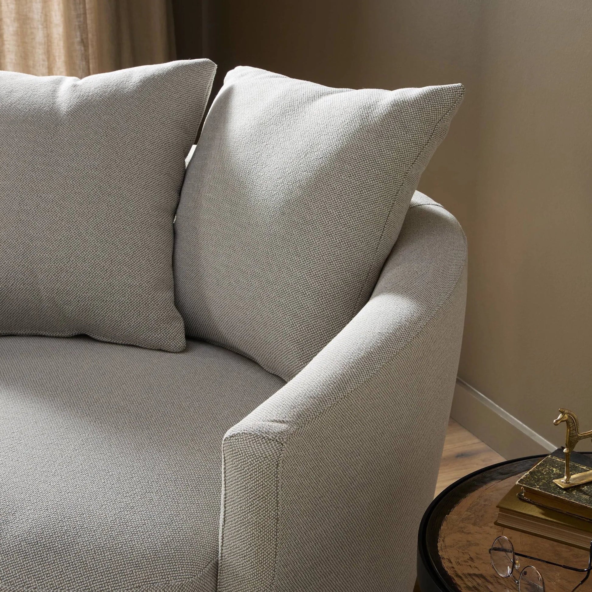 Chloe Swivel Chair by Four Hands in delta bisque. Made from 97% olefin, 3% polyester, solid pine, 51% post consumer recycled polyester, 49% polyester in a modern style.