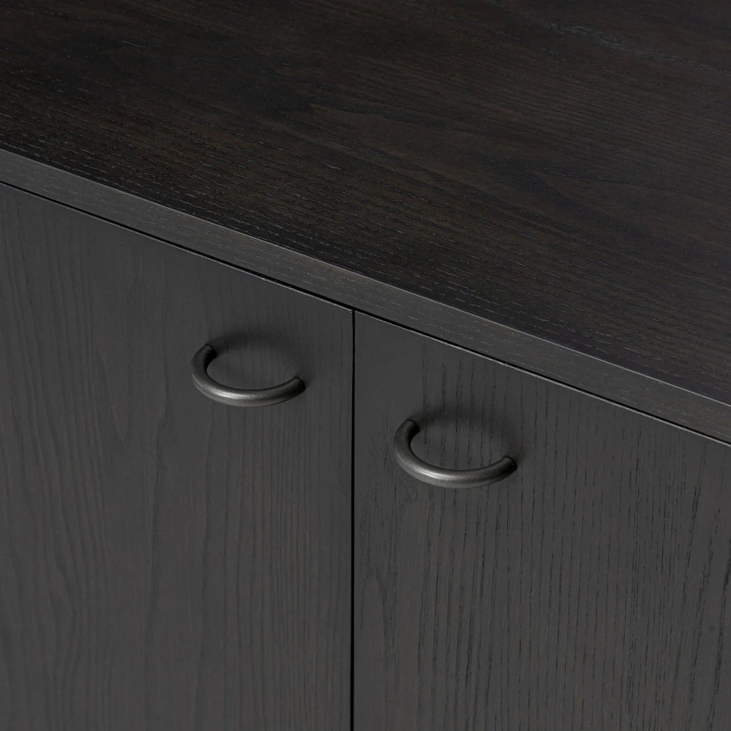 009 SI-2519342 | Closeup | Zuma Sideboard by Four Hands in smoked black ash veneer, black paper cord. Made from ash veneer, rush, solid ash in a transitional style.