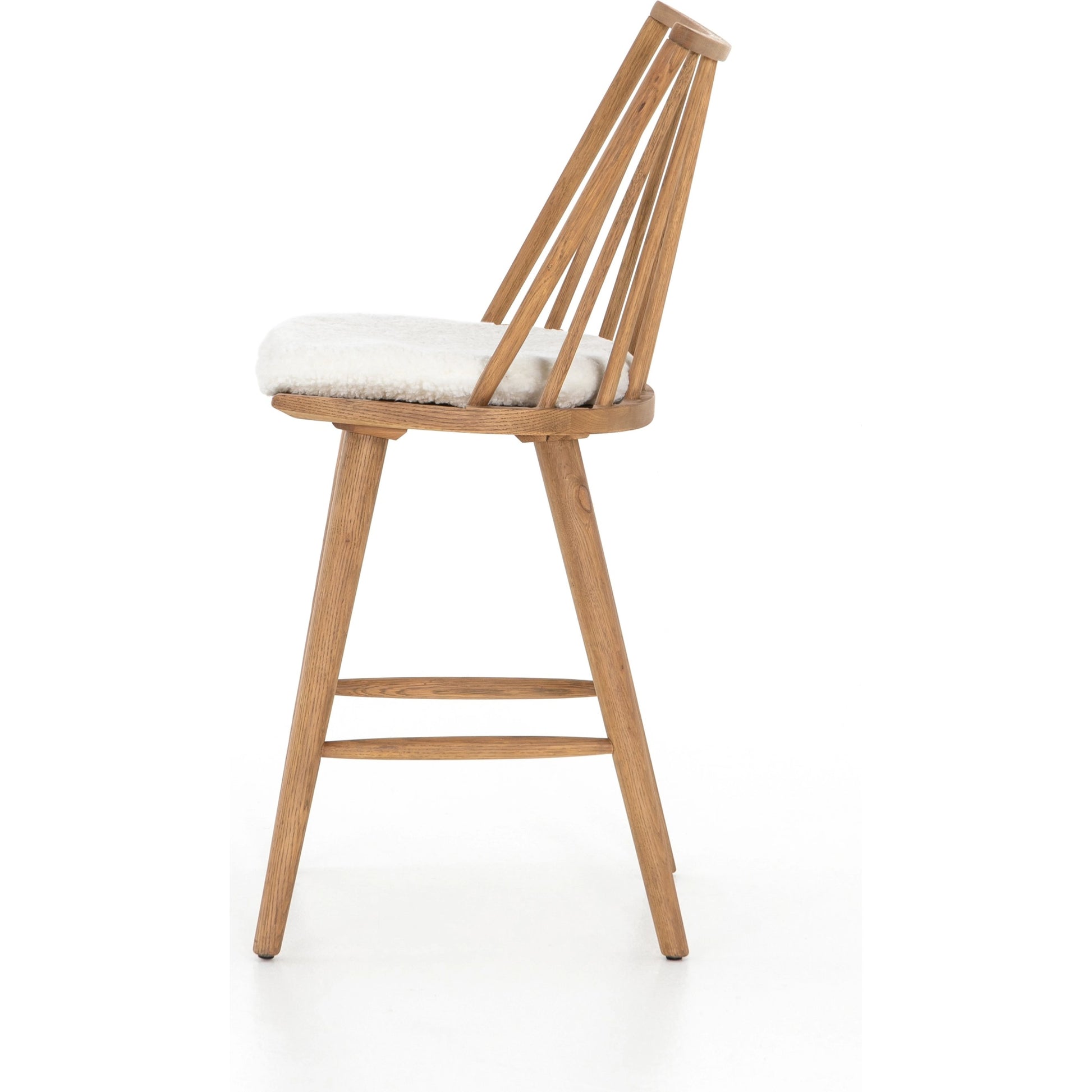 Lewis Windsor Counter Stool by Four Hands. Made from unique in a transitional style.