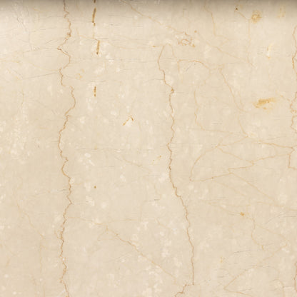 Arum Dining Table by Four Hands in cream marble. Made from solid marble in a coastal style.