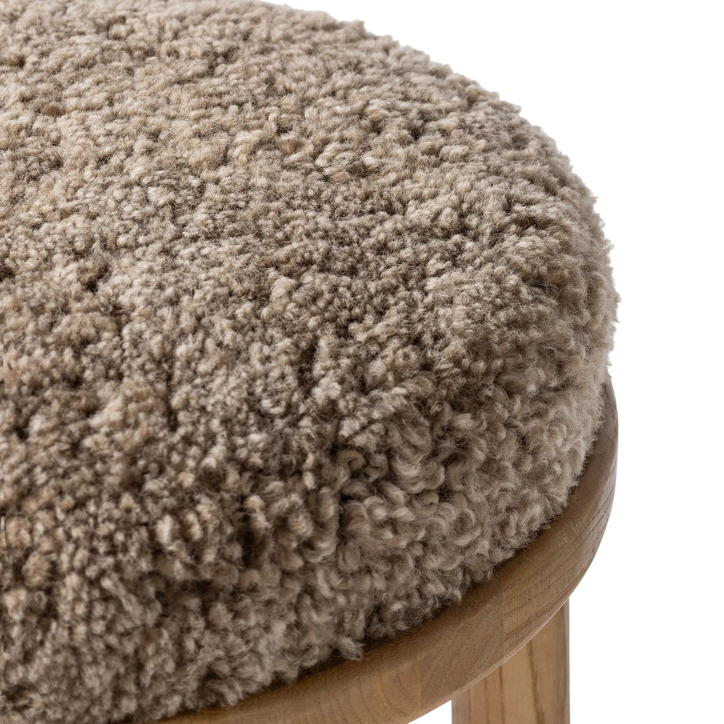 005 SI-2535319 | Closeup | Saldino Bar Stool by Four Hands in taupe shearling, sandy nettlewood. Made from shearling, solid nettlewood in a unique style.