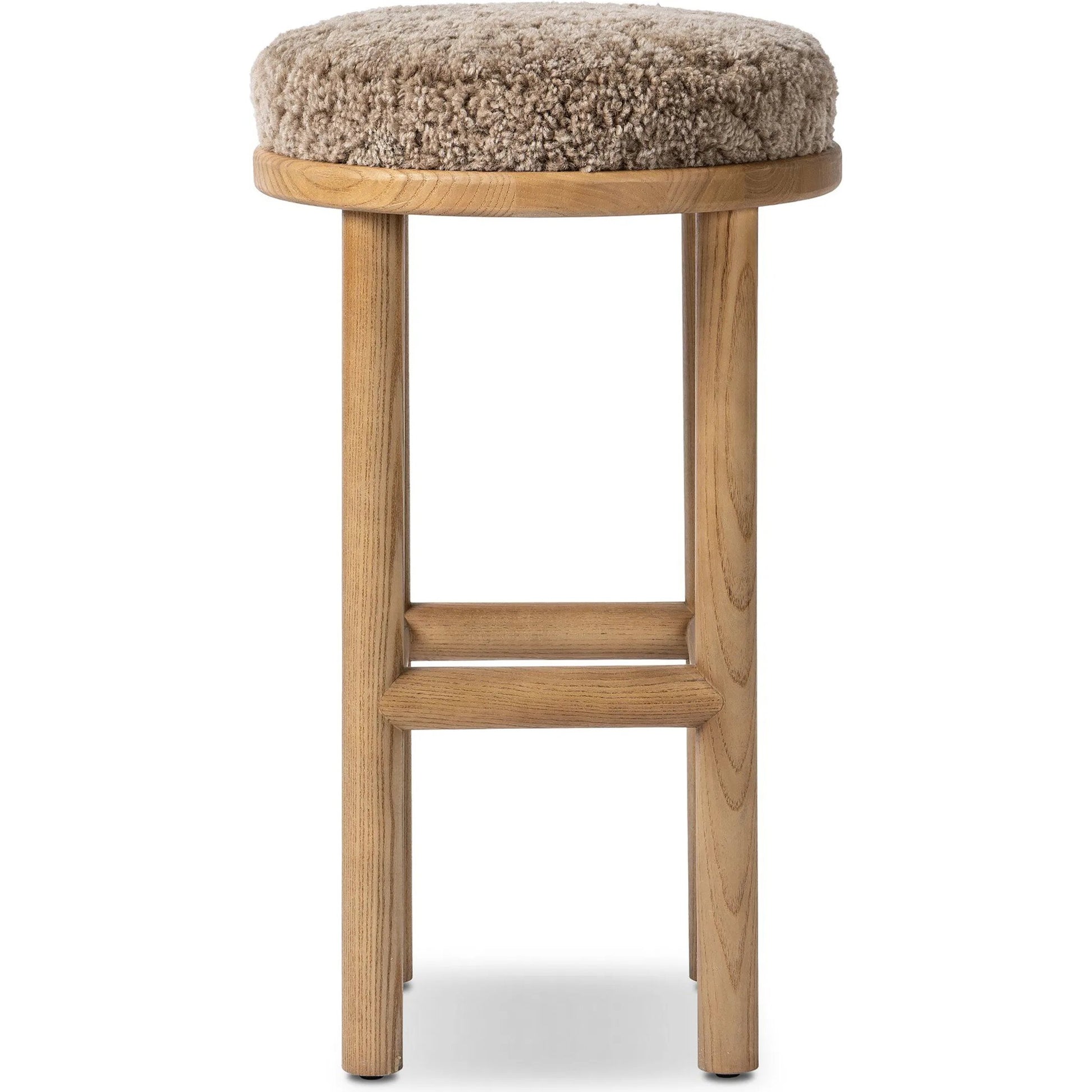 Saldino Bar Stool by Four Hands in taupe shearling, sandy nettlewood. Made from shearling, solid nettlewood in a unique style.