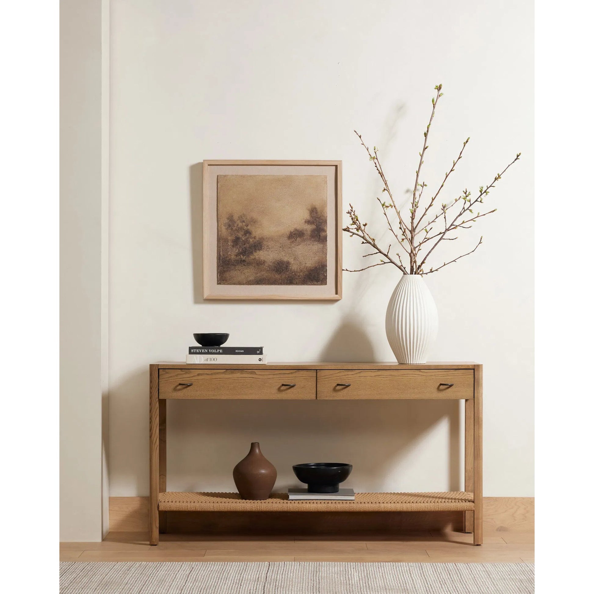 Zuma Console by Four Hands in dune ash, gunmetal, natural paper cord. Made from solid ash, rush in a coastal style.