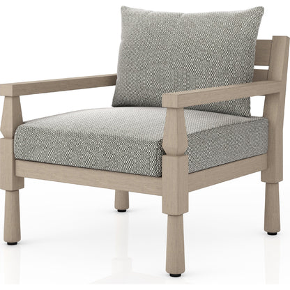 Waller Outdoor Chair by Four Hands in stone grey, weathered grey and weathered grey in stone grey. Made from 100% olefin, solid fsc®-certified teak, 59% polyurethane foam, 30% polyester fiber, 11% polyester fiber batting in a transitio