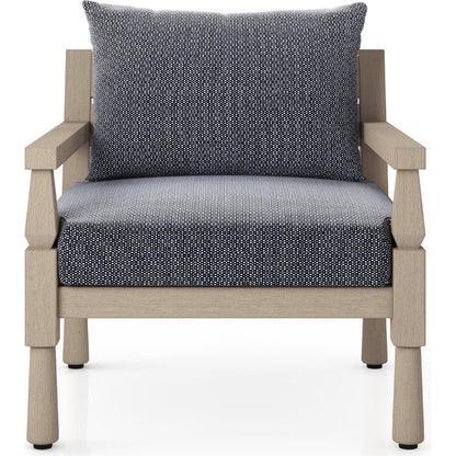 Waller Outdoor Chair by Four Hands in stone grey, weathered grey and weathered grey in stone grey. Made from 100% olefin, solid fsc®-certified teak, 59% polyurethane foam, 30% polyester fiber, 11% polyester fiber batting in a transitio