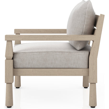 Waller Outdoor Chair by Four Hands in stone grey, weathered grey and weathered grey in stone grey. Made from 100% olefin, solid fsc®-certified teak, 59% polyurethane foam, 30% polyester fiber, 11% polyester fiber batting in a transitio