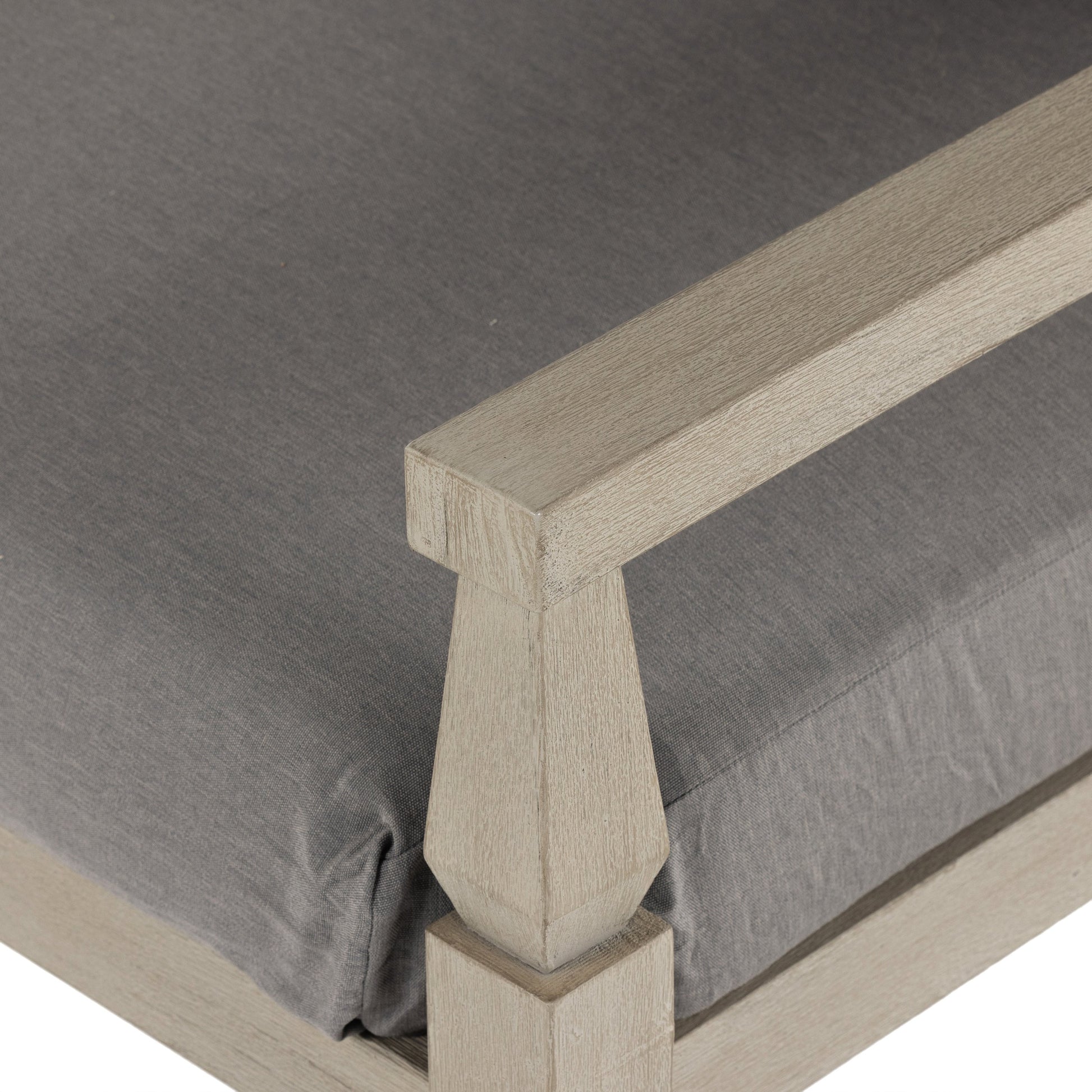 Waller Outdoor Chair by Four Hands in stone grey, weathered grey and weathered grey in stone grey. Made from 100% olefin, solid fsc®-certified teak, 59% polyurethane foam, 30% polyester fiber, 11% polyester fiber batting in a transitio