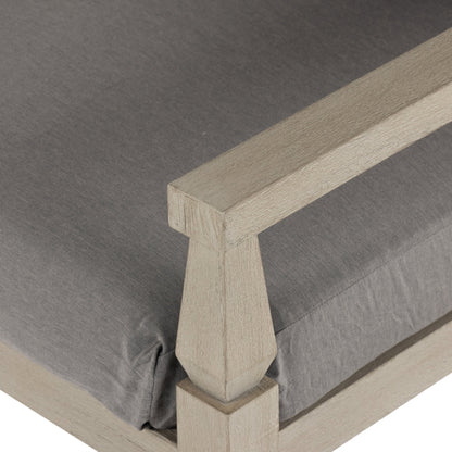 Waller Outdoor Chair by Four Hands in stone grey, weathered grey and weathered grey in stone grey. Made from 100% olefin, solid fsc®-certified teak, 59% polyurethane foam, 30% polyester fiber, 11% polyester fiber batting in a transitio