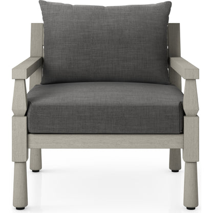 Waller Outdoor Chair by Four Hands in stone grey, weathered grey and weathered grey in stone grey. Made from 100% olefin, solid fsc®-certified teak, 59% polyurethane foam, 30% polyester fiber, 11% polyester fiber batting in a transitio