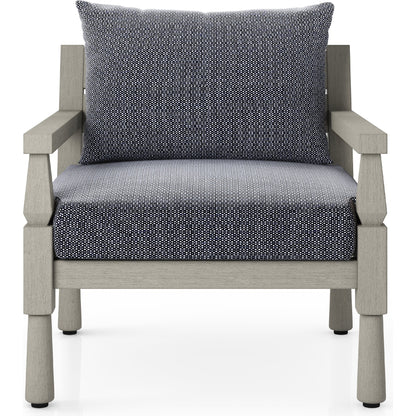 Waller Outdoor Chair by Four Hands in stone grey, weathered grey and weathered grey in stone grey. Made from 100% olefin, solid fsc®-certified teak, 59% polyurethane foam, 30% polyester fiber, 11% polyester fiber batting in a transitio