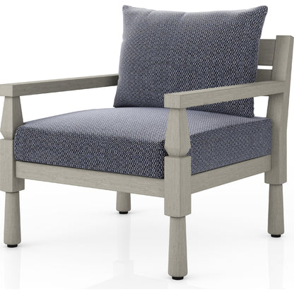 Waller Outdoor Chair by Four Hands in stone grey, weathered grey and weathered grey in stone grey. Made from 100% olefin, solid fsc®-certified teak, 59% polyurethane foam, 30% polyester fiber, 11% polyester fiber batting in a transitio