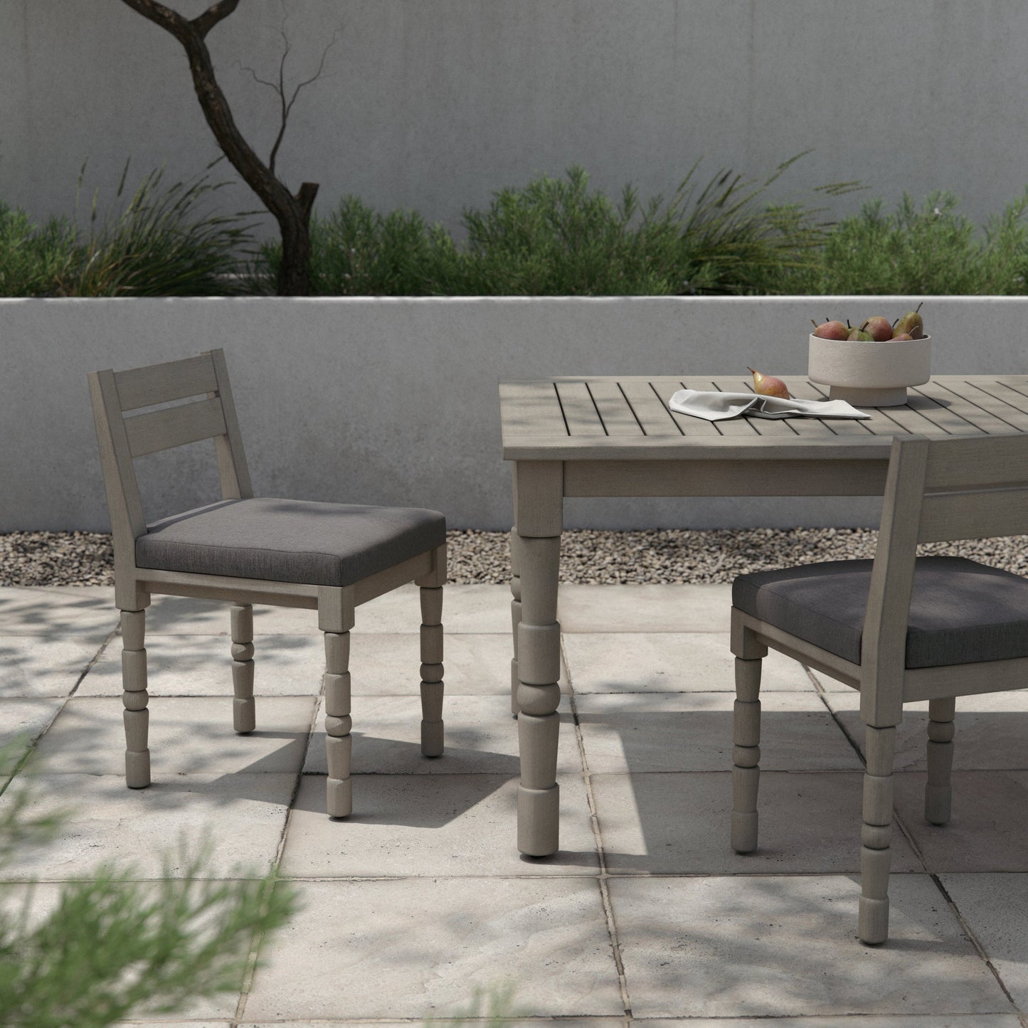 021 SI-1902119 | Lifestyle | Waller Outdoor Dining Chair, Weathered Grey by Four Hands in weathered grey. Made from 100% olefin, solid fsc®-certified teak, 91% polyurethane foam pad, 9% polyester fiber batting in a transitional style.