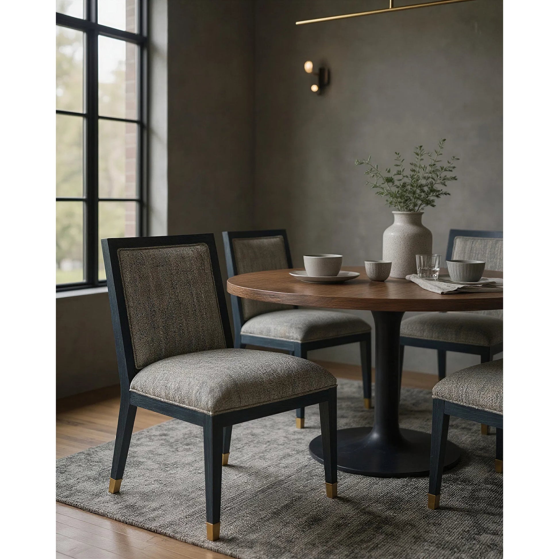 Santos Side Chair by Currey and Company. Made from mahogany, rattan, brass in a modern style.