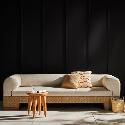 Joss Outdoor Sofa by Four Hands. Made from 100% olefin, solid teak, 100% polyethylene in a coastal style.