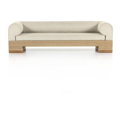 Joss Outdoor Sofa by Four Hands. Made from 100% olefin, solid teak, 100% polyethylene in a coastal style.