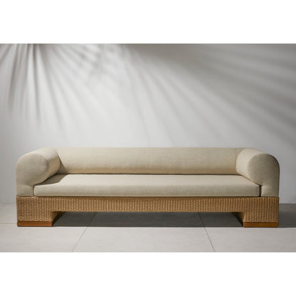 Joss Outdoor Sofa by Four Hands. Made from 100% olefin, solid teak, 100% polyethylene in a coastal style.