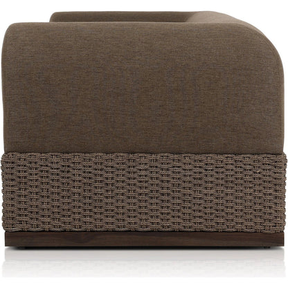 Joss Outdoor Sofa by Four Hands. Made from 100% olefin, solid teak, 100% polyethylene in a coastal style.