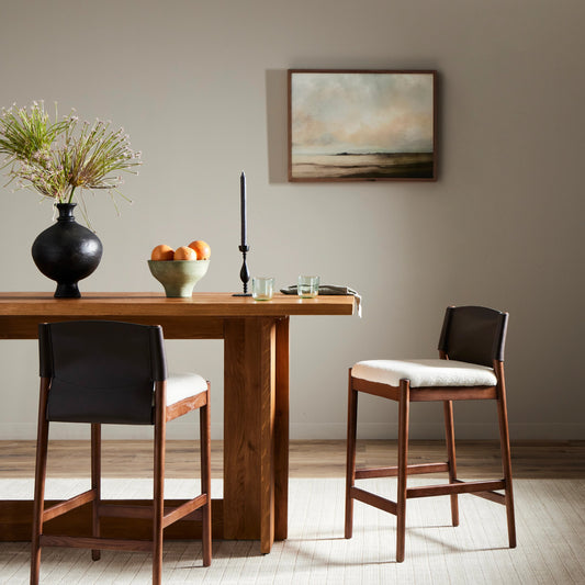 Lulu Counter Stool by Four Hands in espresso leather blend, umber ash, cardiff cream. Made from 100% polyester, solid ash, 70% split leather, 30% polyvinyl chloride (pvc) in a transitional style.