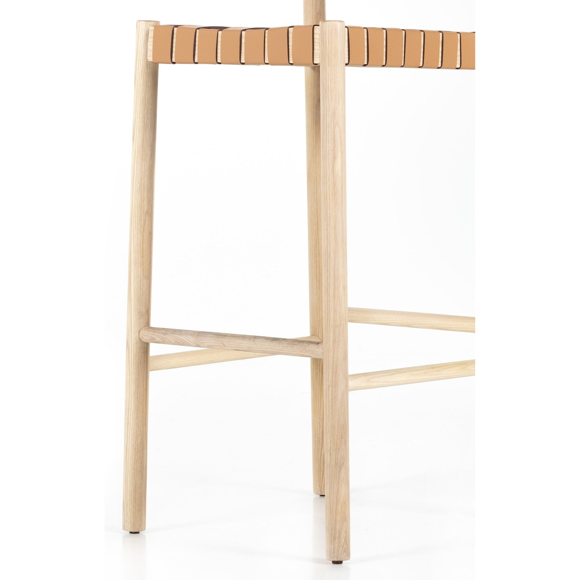 Heisler Bar Stool by Four Hands in black. Made from 70% split leather, 30% polyvinyl chloride (pvc), solid ash, ash veneer in a modern style.