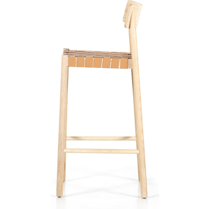 Heisler Bar Stool by Four Hands in black. Made from 70% split leather, 30% polyvinyl chloride (pvc), solid ash, ash veneer in a modern style.