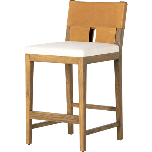 Sem Counter Stool by Four Hands in palermo butterscotch, lamont nettlewood, halcyon ivory. Made from 92% polyester, 8% flax, linen, solid nettlewood, top grain leather in a modern style.