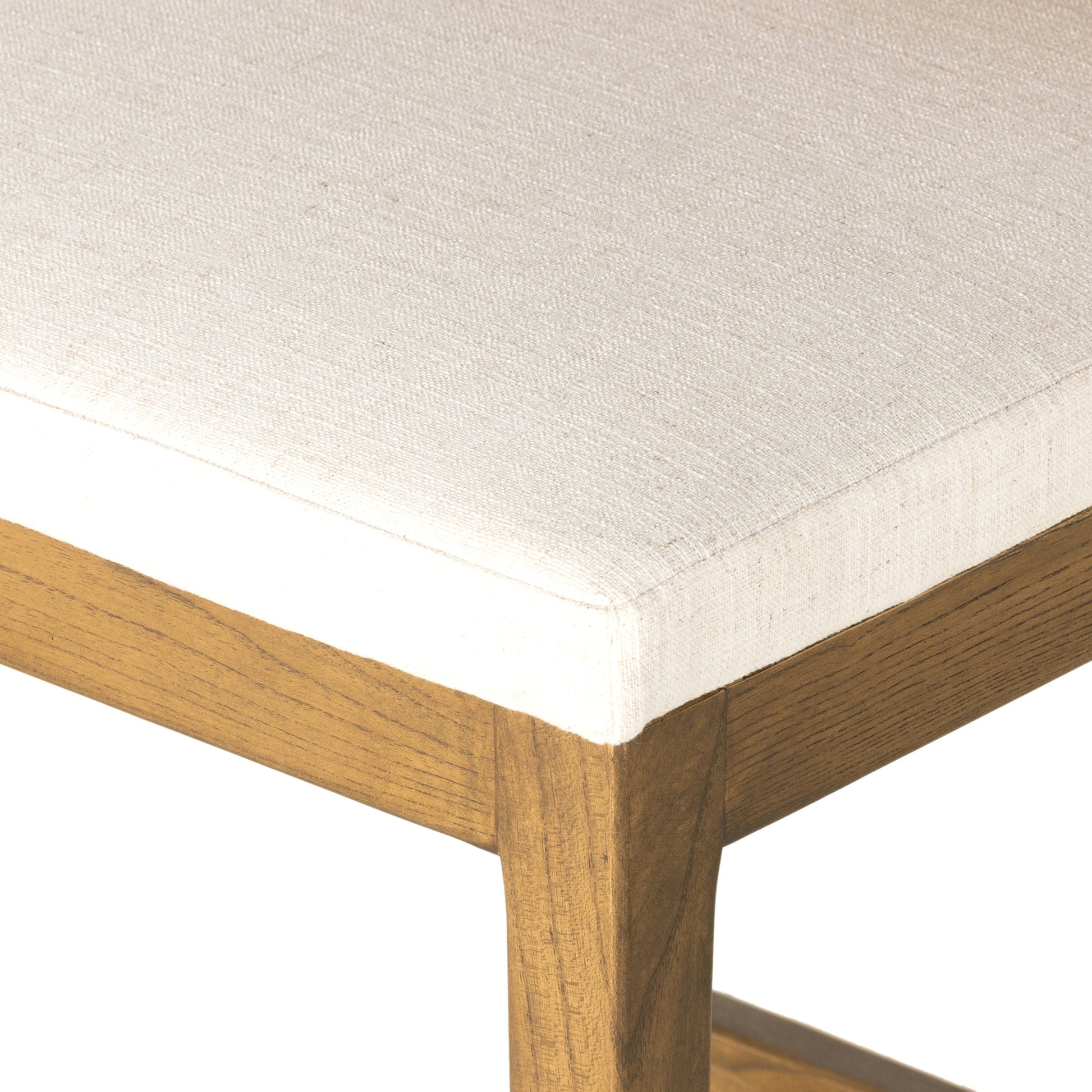 Sem Counter Stool by Four Hands in palermo butterscotch, lamont nettlewood, halcyon ivory. Made from 92% polyester, 8% flax, linen, solid nettlewood, top grain leather in a modern style.