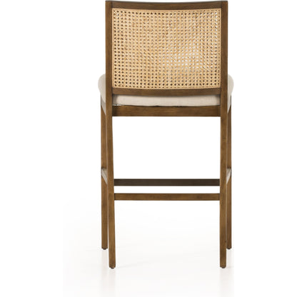 Antonia Cane Armless Bar Stool by Four Hands. Made from unique in a coastal style.