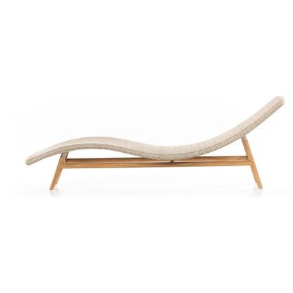 Portia Outdoor Chaise by Four Hands. Made from 100% polyethylene, solid teak, iron in a coastal style.